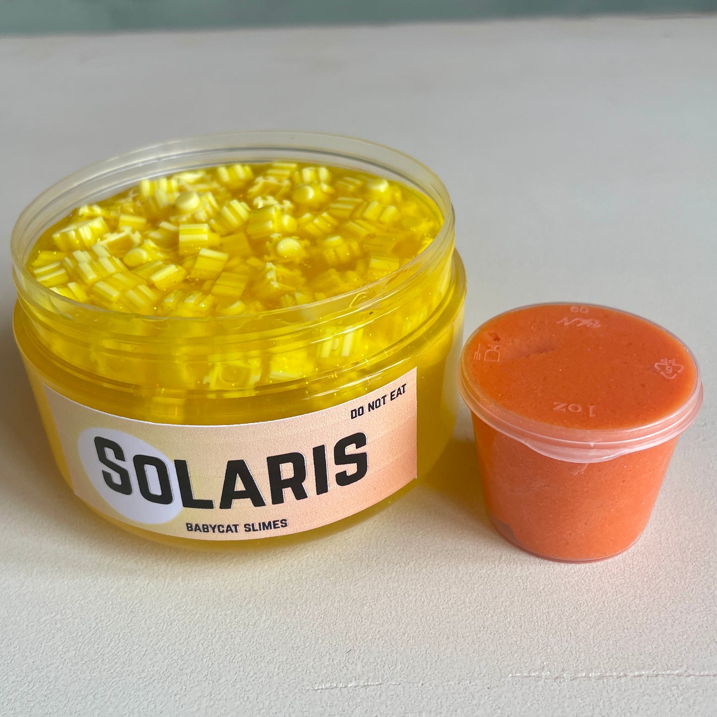 Solaris - Coated clear block bead + cloud slime