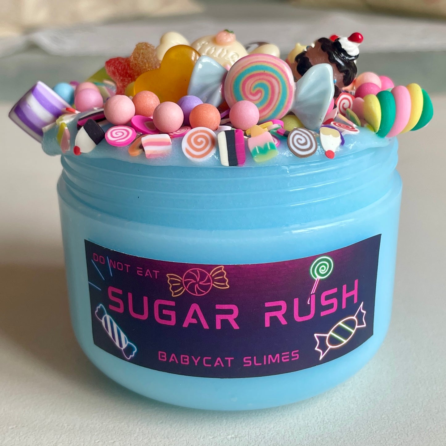 Baby clue candy jelly slime with crunchy candy toppings and charms